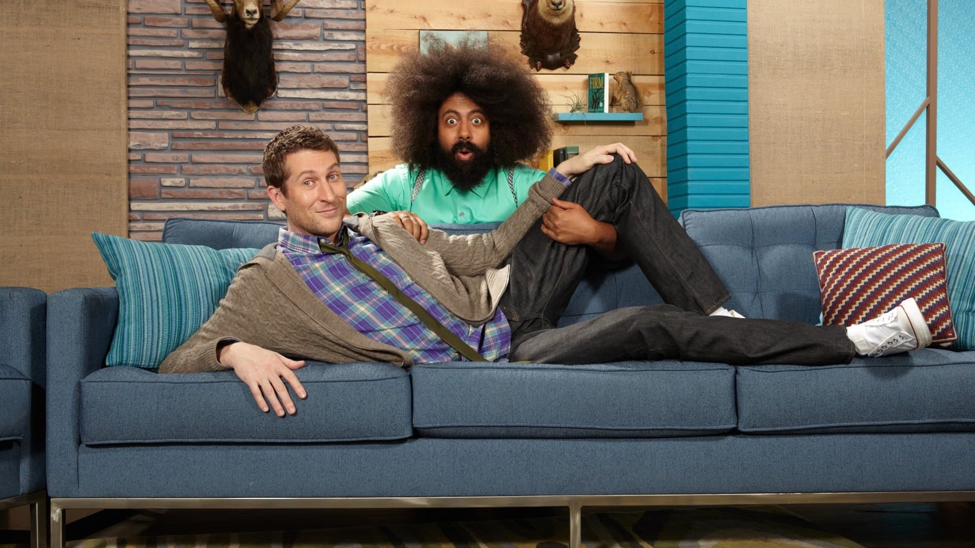 Zach Galifianakis Wears a Blue Jacket & Red Socks